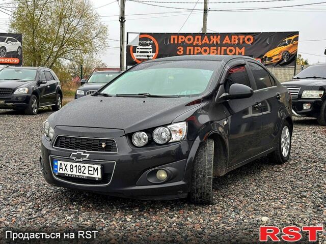 Черный Шевроле Авео, объемом двигателя 1.6 л и пробегом 191 тыс. км за 5800 $, фото 2 на Automoto.ua