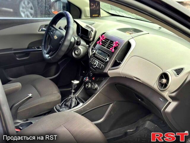 Черный Шевроле Авео, объемом двигателя 1.6 л и пробегом 191 тыс. км за 5800 $, фото 6 на Automoto.ua