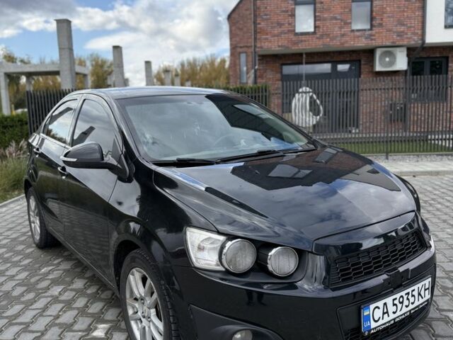 Шевроле Авео 2013 в Умани на Automoto.ua Черный Шевроле Авео, объемом двигателя 1.4 л и пробегом 210 тыс. км за 4500 $, фото 1 на Automoto.ua