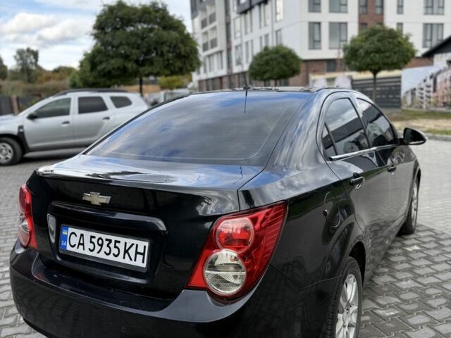 Шевроле Авео 2013 в Умани на Automoto.ua Черный Шевроле Авео, объемом двигателя 1.4 л и пробегом 210 тыс. км за 4500 $, фото 5 на Automoto.ua