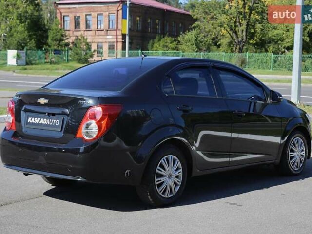 Черный Шевроле Авео, объемом двигателя 1.4 л и пробегом 155 тыс. км за 7000 $, фото 3 на Automoto.ua