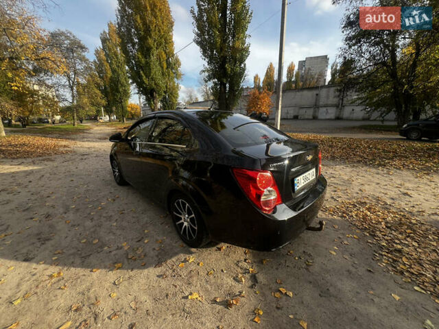 Чорний Шевроле Авео, об'ємом двигуна 1.4 л та пробігом 200 тис. км за 6300 $, фото 5 на Automoto.ua