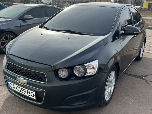 Черный Шевроле Авео, объемом двигателя 1.4 л и пробегом 172 тыс. км за 3100 $, фото 2 на Automoto.ua