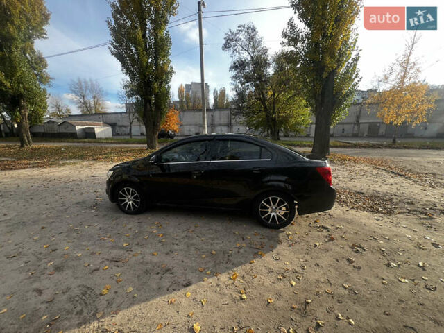 Чорний Шевроле Авео, об'ємом двигуна 1.4 л та пробігом 200 тис. км за 6300 $, фото 6 на Automoto.ua