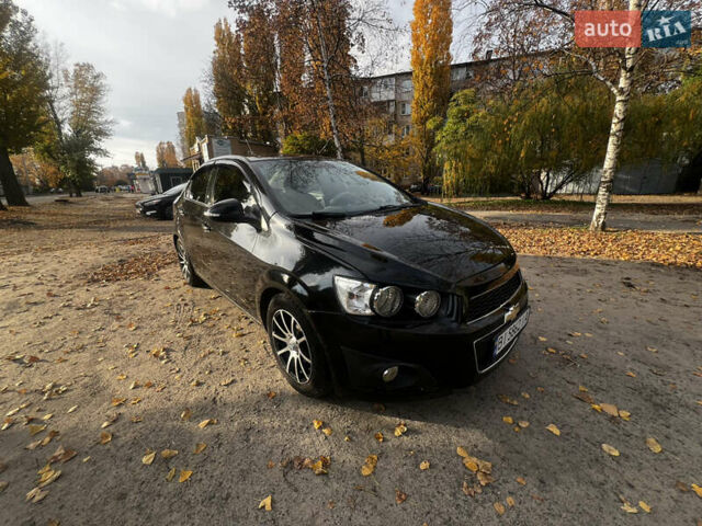Чорний Шевроле Авео, об'ємом двигуна 1.4 л та пробігом 200 тис. км за 6300 $, фото 3 на Automoto.ua