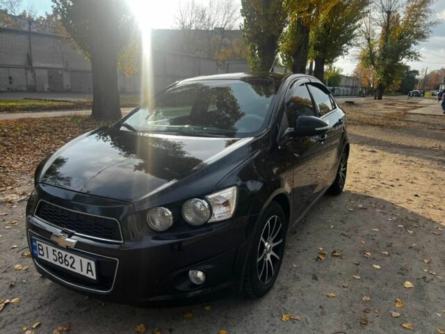 Черный Шевроле Авео, объемом двигателя 1.4 л и пробегом 200 тыс. км за 6300 $, фото 1 на Automoto.ua