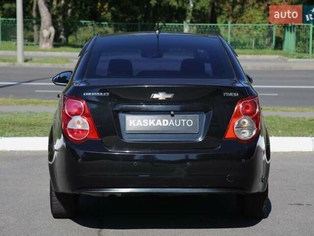 Черный Шевроле Авео, объемом двигателя 1.4 л и пробегом 155 тыс. км за 7000 $, фото 4 на Automoto.ua