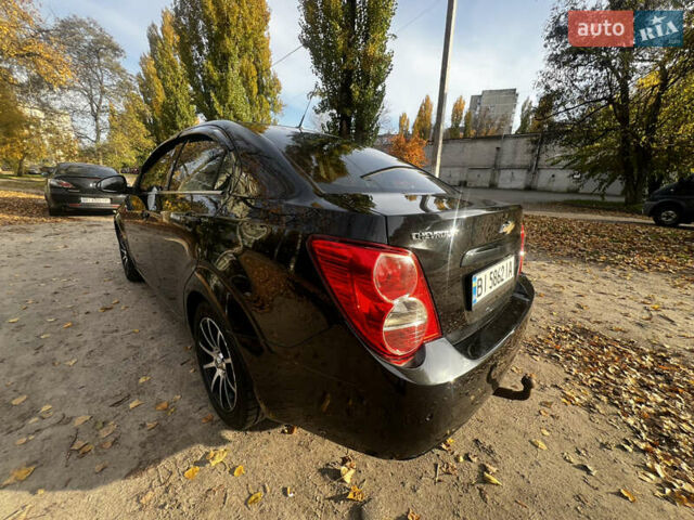 Чорний Шевроле Авео, об'ємом двигуна 1.4 л та пробігом 200 тис. км за 6300 $, фото 4 на Automoto.ua