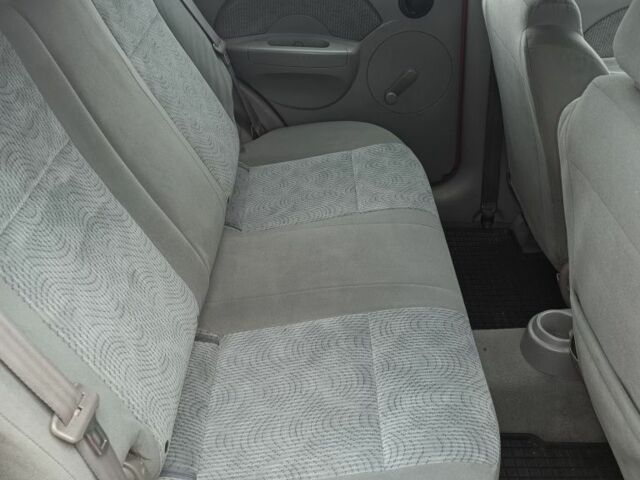 Красный Шевроле Авео, объемом двигателя 1.2 л и пробегом 305 тыс. км за 1600 $, фото 3 на Automoto.ua