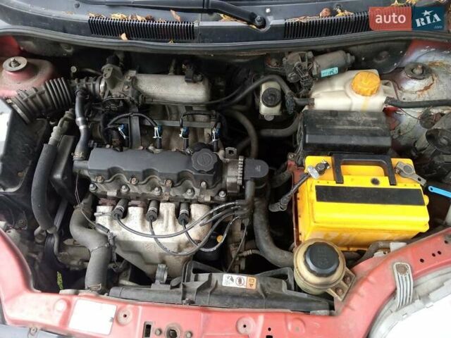Червоний Шевроле Авео, об'ємом двигуна 1.5 л та пробігом 210 тис. км за 2200 $, фото 7 на Automoto.ua