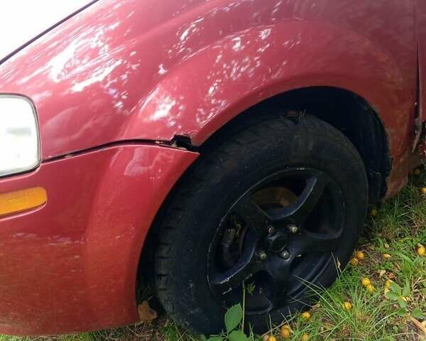 Червоний Шевроле Авео, об'ємом двигуна 1.5 л та пробігом 210 тис. км за 2200 $, фото 6 на Automoto.ua