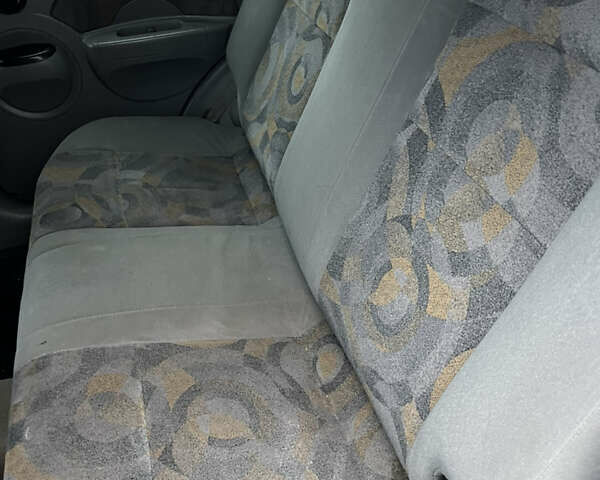 Червоний Шевроле Авео, об'ємом двигуна 1.5 л та пробігом 230 тис. км за 3250 $, фото 3 на Automoto.ua