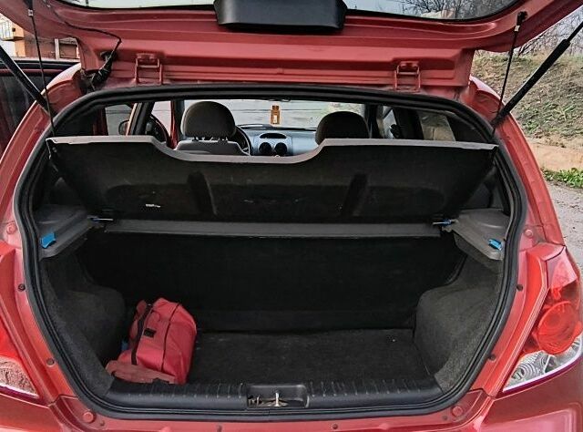 Красный Шевроле Авео, объемом двигателя 1.5 л и пробегом 281 тыс. км за 2900 $, фото 10 на Automoto.ua