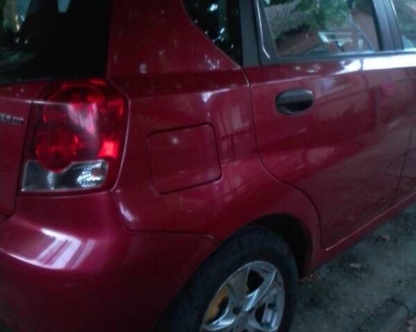 Красный Шевроле Авео, объемом двигателя 1.5 л и пробегом 130 тыс. км за 2400 $, фото 1 на Automoto.ua