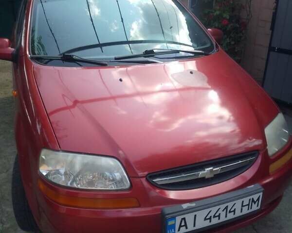 Красный Шевроле Авео, объемом двигателя 1.5 л и пробегом 130 тыс. км за 2400 $, фото 2 на Automoto.ua