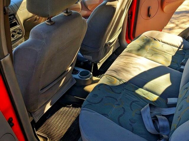 Красный Шевроле Авео, объемом двигателя 1.5 л и пробегом 190 тыс. км за 2800 $, фото 8 на Automoto.ua