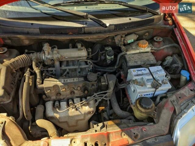 Красный Шевроле Авео, объемом двигателя 1.5 л и пробегом 190 тыс. км за 2800 $, фото 10 на Automoto.ua