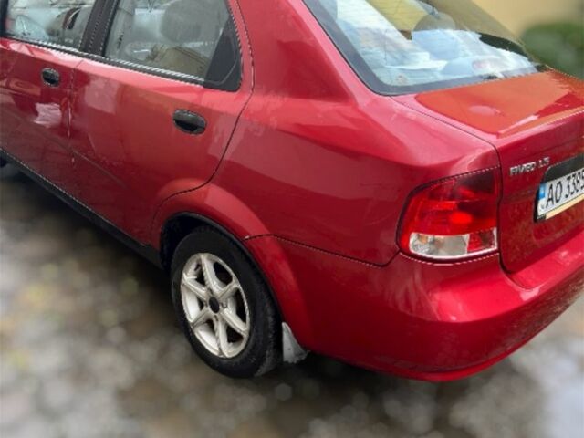 Красный Шевроле Авео, объемом двигателя 1.6 л и пробегом 230 тыс. км за 2300 $, фото 1 на Automoto.ua