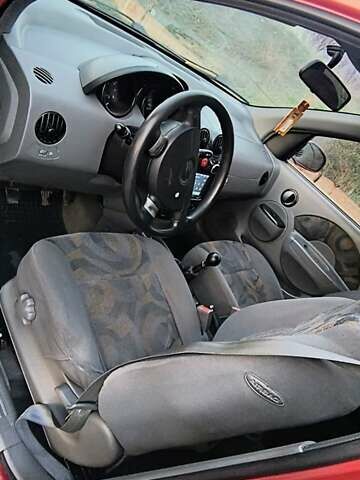 Красный Шевроле Авео, объемом двигателя 1.5 л и пробегом 281 тыс. км за 2900 $, фото 5 на Automoto.ua