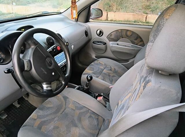 Красный Шевроле Авео, объемом двигателя 1.5 л и пробегом 281 тыс. км за 2900 $, фото 5 на Automoto.ua