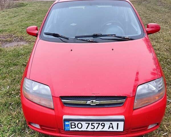 Красный Шевроле Авео, объемом двигателя 1.5 л и пробегом 242 тыс. км за 2550 $, фото 1 на Automoto.ua