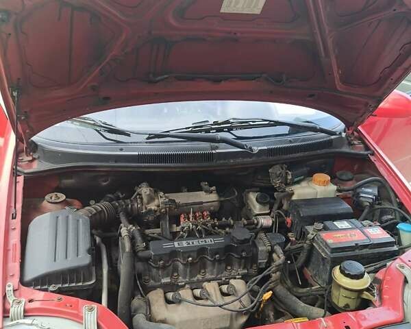 Красный Шевроле Авео, объемом двигателя 1.5 л и пробегом 135 тыс. км за 3650 $, фото 8 на Automoto.ua