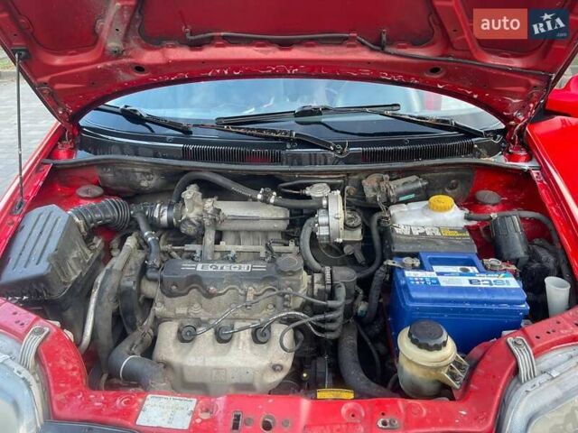 Красный Шевроле Авео, объемом двигателя 1.5 л и пробегом 300 тыс. км за 2700 $, фото 11 на Automoto.ua
