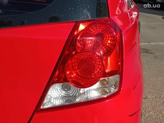 Червоний Шевроле Авео, об'ємом двигуна 1.5 л та пробігом 219 тис. км за 3990 $, фото 11 на Automoto.ua
