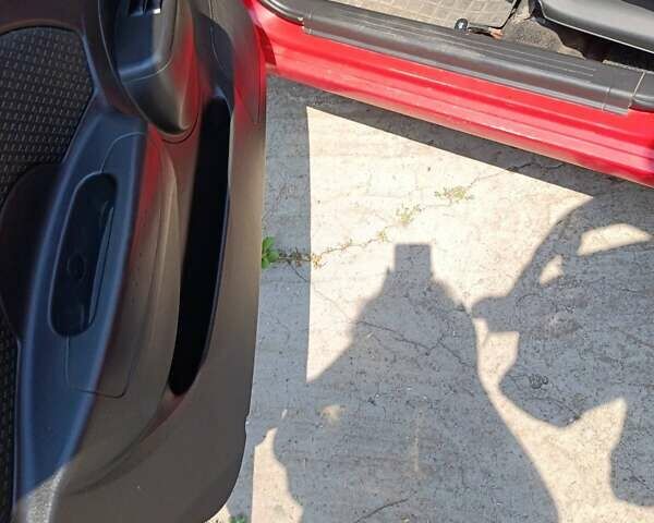 Красный Шевроле Авео, объемом двигателя 1.5 л и пробегом 135 тыс. км за 3650 $, фото 5 на Automoto.ua