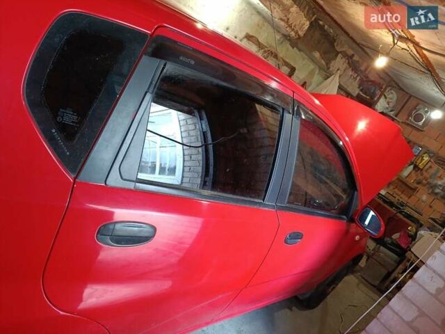Красный Шевроле Авео, объемом двигателя 1.5 л и пробегом 135 тыс. км за 3650 $, фото 32 на Automoto.ua