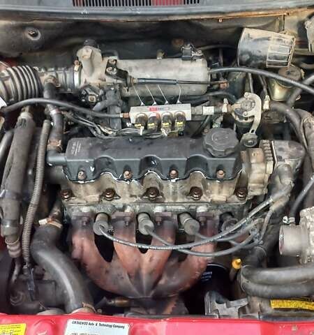 Червоний Шевроле Авео, об'ємом двигуна 1.5 л та пробігом 140 тис. км за 3100 $, фото 1 на Automoto.ua