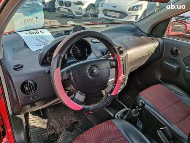 Червоний Шевроле Авео, об'ємом двигуна 1.5 л та пробігом 219 тис. км за 3990 $, фото 13 на Automoto.ua