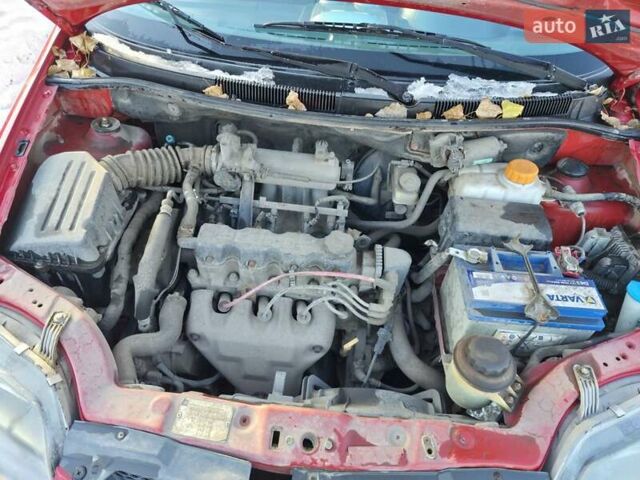 Красный Шевроле Авео, объемом двигателя 1.5 л и пробегом 148 тыс. км за 3750 $, фото 15 на Automoto.ua