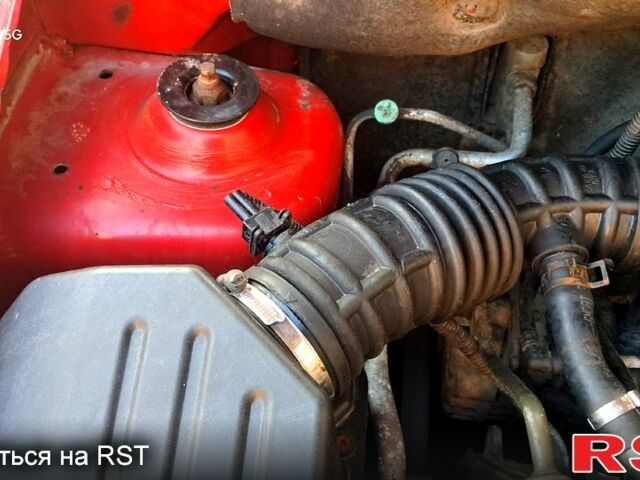 Червоний Шевроле Авео, об'ємом двигуна 1.5 л та пробігом 235 тис. км за 2800 $, фото 4 на Automoto.ua
