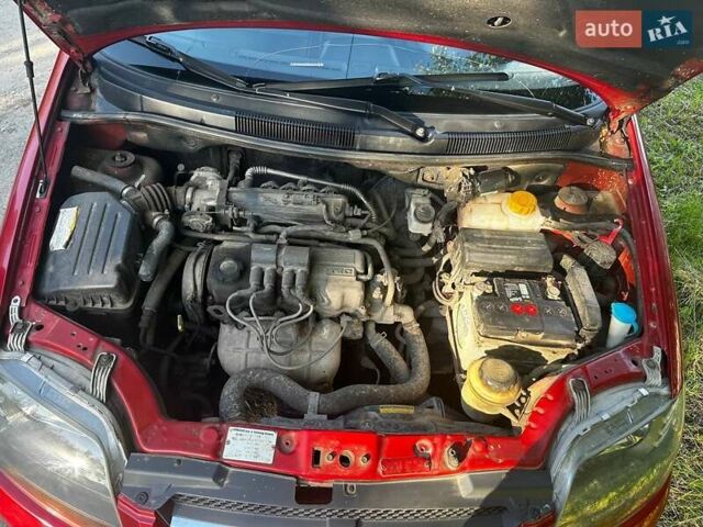 Червоний Шевроле Авео, об'ємом двигуна 1.1 л та пробігом 173 тис. км за 3000 $, фото 1 на Automoto.ua