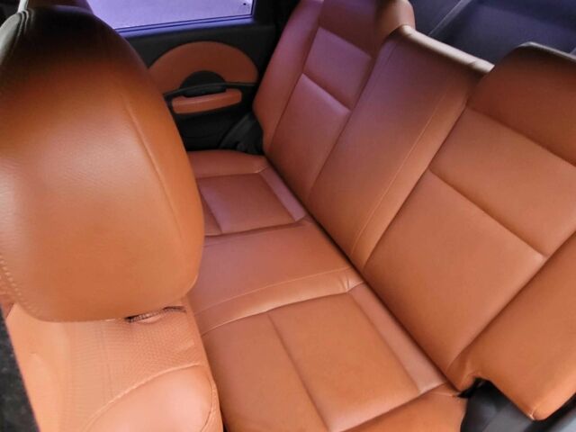 Красный Шевроле Авео, объемом двигателя 1.5 л и пробегом 220 тыс. км за 3650 $, фото 1 на Automoto.ua