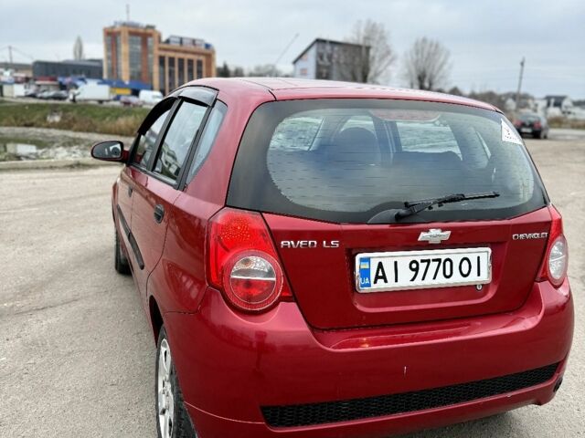 Красный Шевроле Авео, объемом двигателя 1.5 л и пробегом 327 тыс. км за 3600 $, фото 1 на Automoto.ua