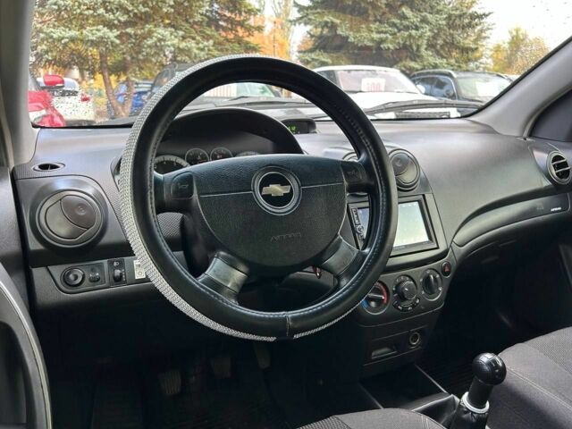 Красный Шевроле Авео, объемом двигателя 1.2 л и пробегом 240 тыс. км за 3999 $, фото 9 на Automoto.ua