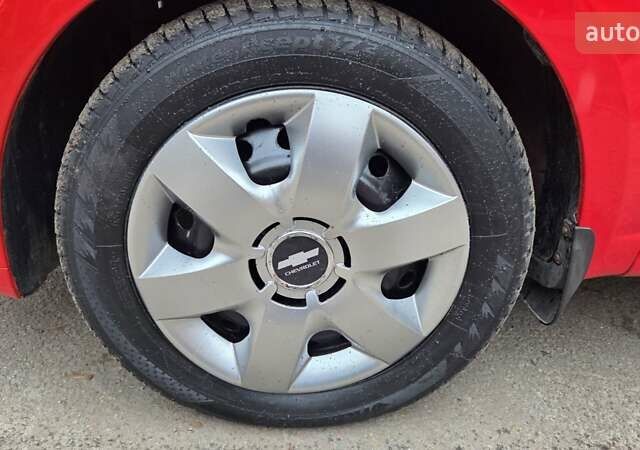 Красный Шевроле Авео, объемом двигателя 1.5 л и пробегом 177 тыс. км за 5500 $, фото 60 на Automoto.ua