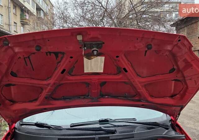 Красный Шевроле Авео, объемом двигателя 1.5 л и пробегом 177 тыс. км за 5500 $, фото 24 на Automoto.ua