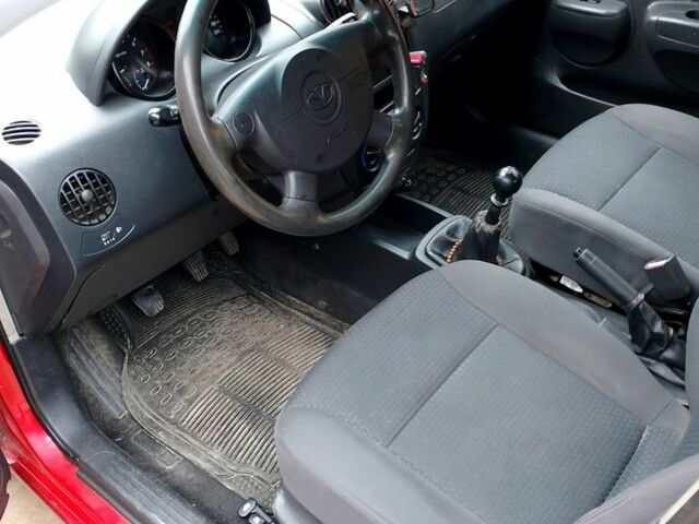 Красный Шевроле Авео, объемом двигателя 1.5 л и пробегом 245 тыс. км за 3300 $, фото 6 на Automoto.ua