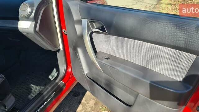 Красный Шевроле Авео, объемом двигателя 1.4 л и пробегом 182 тыс. км за 4400 $, фото 11 на Automoto.ua