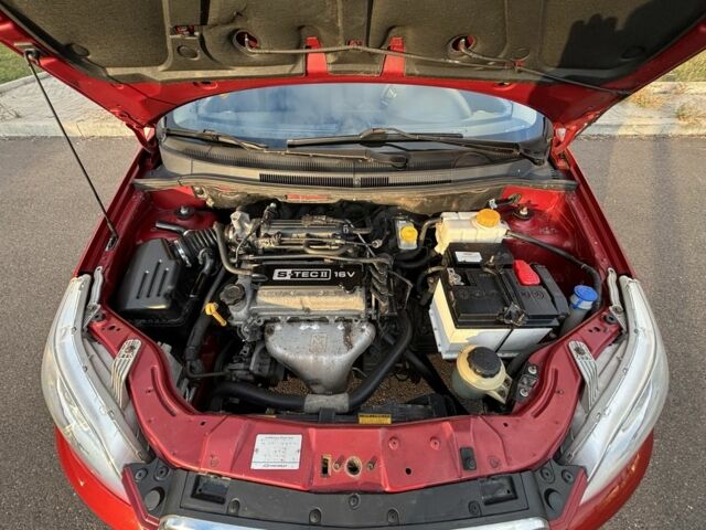 Червоний Шевроле Авео, об'ємом двигуна 1.2 л та пробігом 185 тис. км за 3900 $, фото 13 на Automoto.ua