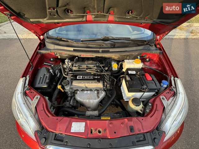 Червоний Шевроле Авео, об'ємом двигуна 1.21 л та пробігом 185 тис. км за 3700 $, фото 11 на Automoto.ua