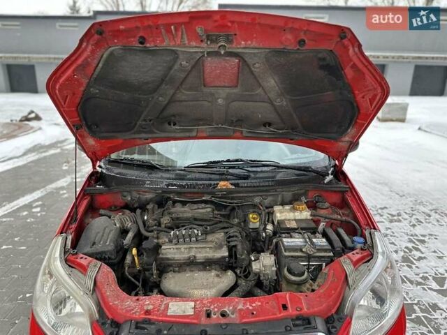 Красный Шевроле Авео, объемом двигателя 1.2 л и пробегом 176 тыс. км за 3600 $, фото 8 на Automoto.ua