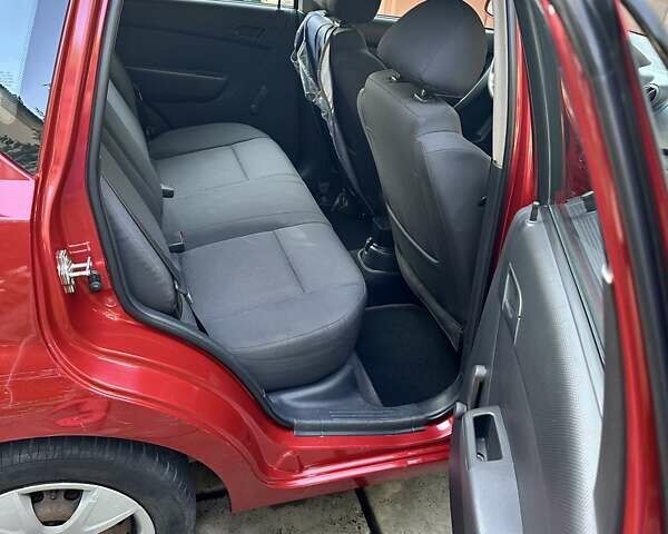 Красный Шевроле Авео, объемом двигателя 1.5 л и пробегом 137 тыс. км за 5500 $, фото 13 на Automoto.ua
