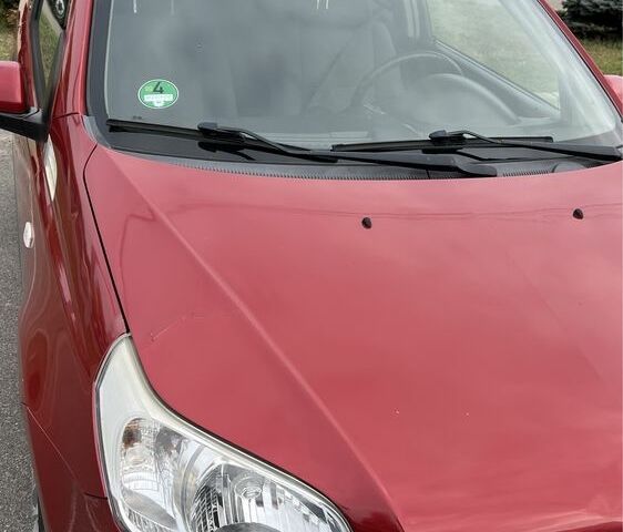 Красный Шевроле Авео, объемом двигателя 1.5 л и пробегом 190 тыс. км за 4300 $, фото 4 на Automoto.ua