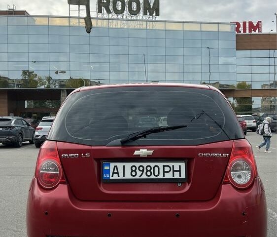 Красный Шевроле Авео, объемом двигателя 1.5 л и пробегом 190 тыс. км за 4300 $, фото 2 на Automoto.ua