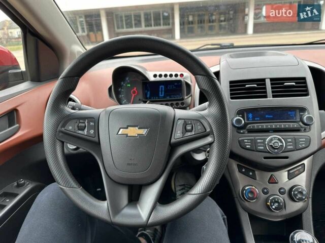 Червоний Шевроле Авео, об'ємом двигуна 1.4 л та пробігом 154 тис. км за 6200 $, фото 7 на Automoto.ua