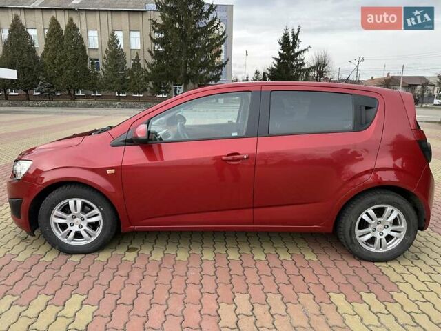Красный Шевроле Авео, объемом двигателя 1.4 л и пробегом 154 тыс. км за 6200 $, фото 3 на Automoto.ua